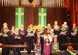 The choir singing in front of the congregation